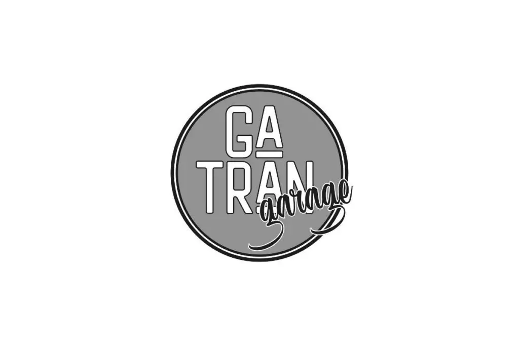 Graues GATRAN Garage Logo in Kreisform